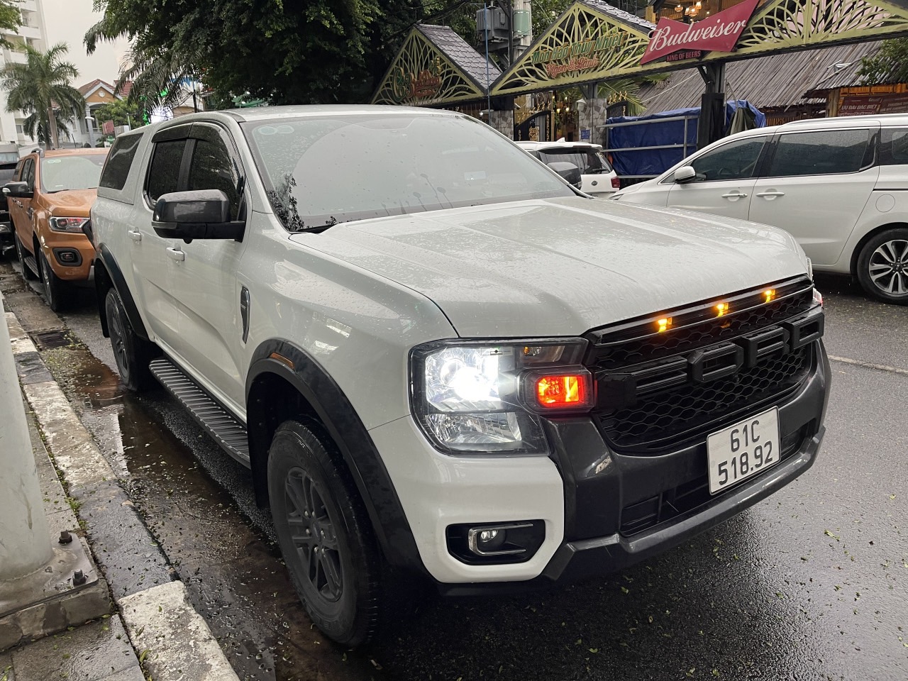 Ford Ranger XLS AT 2 cầu sx 2022 Odo 35.000Km Phụ kiện: Nắp thùng cao, Phim cách nhiệt, ghế da, đèn sau Witrack, cam 360 Giá bán : 715triệu